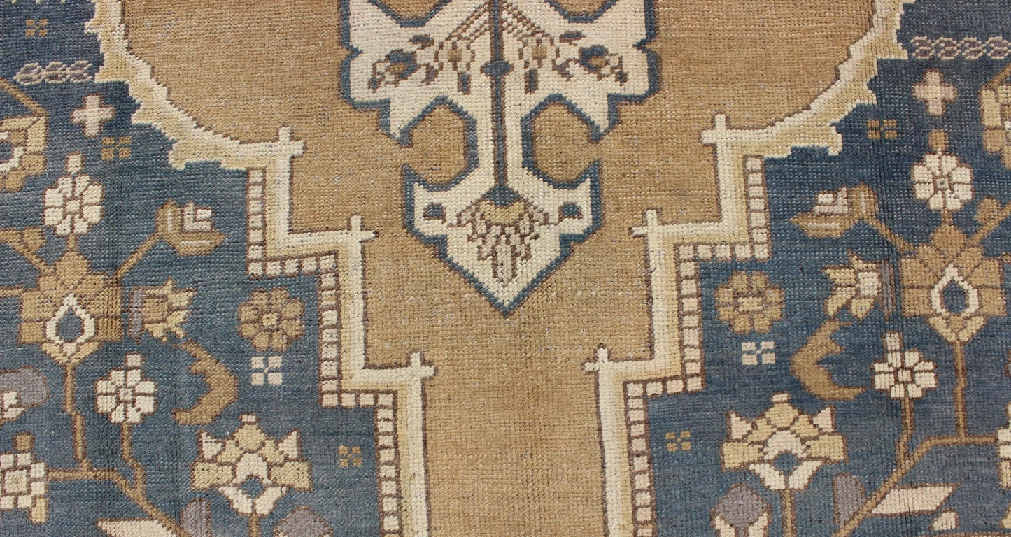 Vintage Turkish Oushak with Floral Medallion in Bronze and Blue Color Measures: 6'10'' x 11'5'' Characterized by a comely and highly representative Oushak composition, this vintage carpet beautifully communicates the finer characteristics of Oush... - Keivan Woven ArtsTU - VEY - 3283 - 6245Rug