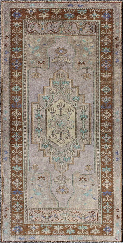 Vintage Oushak Rug in Light Lavender Background and Chocolate Brown Border. Vintage Oushak rug with central medallion in Light lavender, Taupe, Khaki, Teal green, blue accent colors and chocolate brown border. Keivan Woven Arts Rug TU - VEY - 3287,... - Keivan Woven ArtsTU - VEY - 3287 - 5910Rug