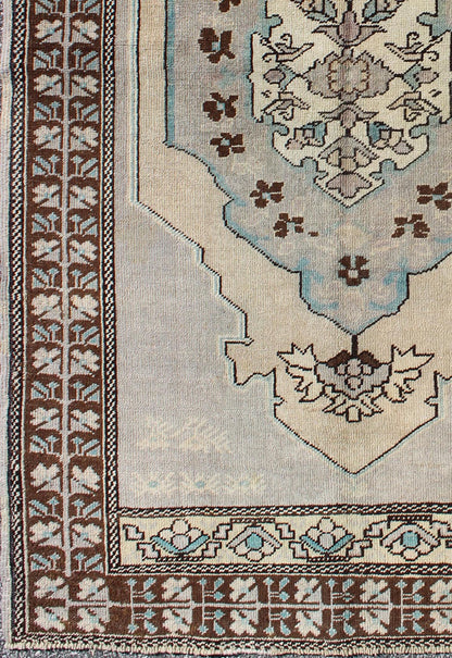 Vintage Turkish Medallion Oushak Area Rug in Gray, Taupe, Brown and Cream Measures: 3'11 x 5'6 This piece was hand - knotted in the mid - century in Turkey. The field displays a diamond medallion decorated with floral motifs. The field is r... - Keivan Woven ArtsTU - VEY - 3289 - 6251Rug