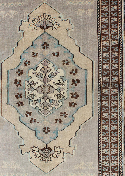 Vintage Turkish Medallion Oushak Area Rug in Gray, Taupe, Brown and Cream Measures: 3'11 x 5'6 This piece was hand - knotted in the mid - century in Turkey. The field displays a diamond medallion decorated with floral motifs. The field is r... - Keivan Woven ArtsTU - VEY - 3289 - 6251Rug