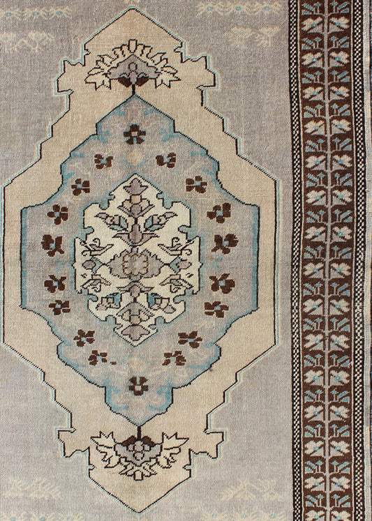 Vintage Turkish Medallion Oushak Area Rug in Gray, Taupe, Brown and Cream Measures: 3'11 x 5'6 This piece was hand - knotted in the mid - century in Turkey. The field displays a diamond medallion decorated with floral motifs. The field is r... - Keivan Woven ArtsTU - VEY - 3289 - 6251