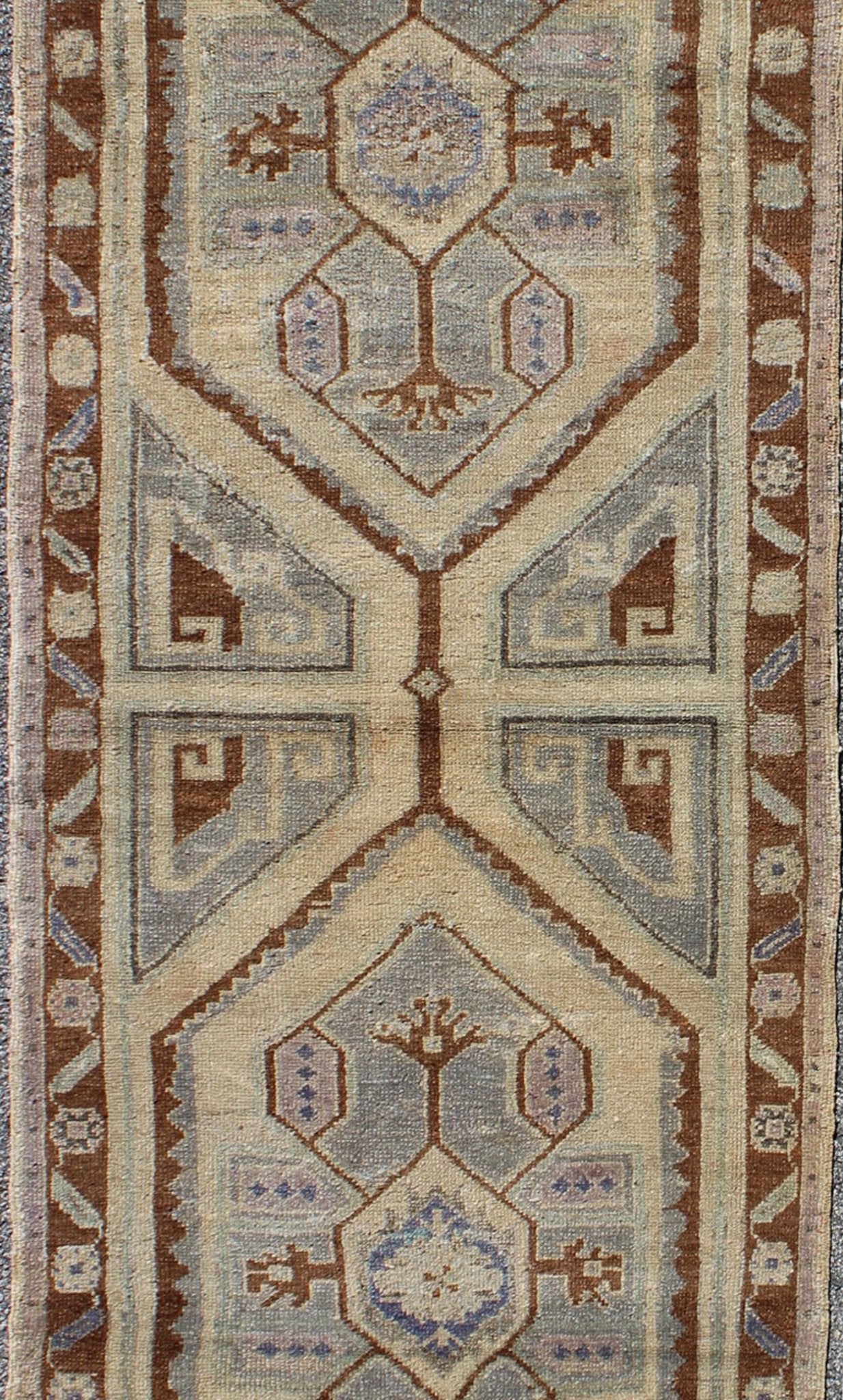 Vintage Turkish Oushak runner with two medallions in nude, blue - gray, red - brown, rug tu - vey - 3290, country of origin / type: Turkey / Oushak, circa 1940 This vintage Turkish Oushak carpet (circa mid - 20th century) features a tribal, central dual - m... - Keivan Woven ArtsTU - VEY - 3290 - 6256Rug