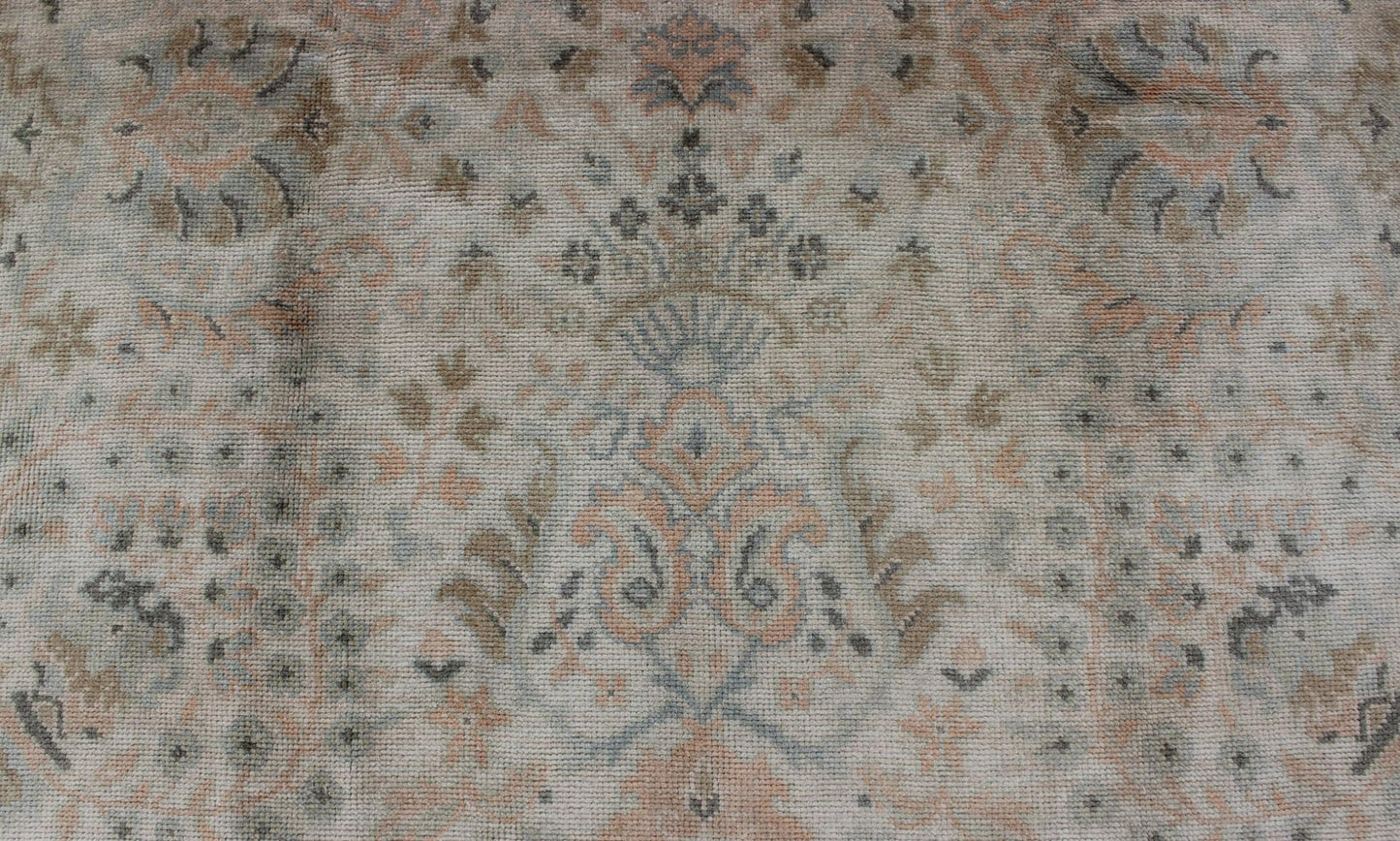 Neutral Vintage Turkish Oushak Rug with Floral Design and Medallions with repeated floral motifs Measures: 6'0 x 9'10 Country of Origin: Turkey; Type: Oushak; Design: All - Over, Floral, Arabesque - Floral; Keivan Woven Arts: rug tu - vey - 46011... - Keivan Woven ArtsTU - VEY - 46011 - 7923Rug