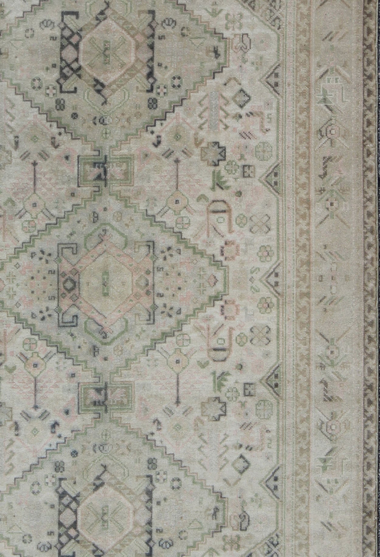 Vintage Turkish Tribal Medallion Oushak in Muted Green, Pink, and Off White Measures: 5'10 x 9'11. This vintage Turkish Oushak rug features a unique blend of colors and an intricately beautiful design. The medallions, arranged in a v... - Keivan Woven ArtsTU - VEY - 4602 - 7911Rug