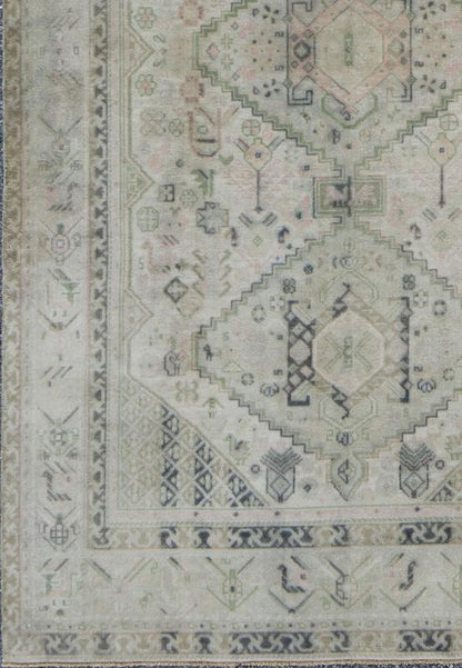Vintage Turkish Tribal Medallion Oushak in Muted Green, Pink, and Off White Measures: 5'10 x 9'11. This vintage Turkish Oushak rug features a unique blend of colors and an intricately beautiful design. The medallions, arranged in a v... - Keivan Woven ArtsTU - VEY - 4602 - 7911Rug