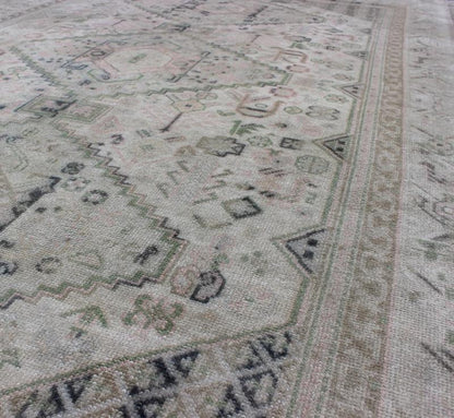 Vintage Turkish Tribal Medallion Oushak in Muted Green, Pink, and Off White Measures: 5'10 x 9'11. This vintage Turkish Oushak rug features a unique blend of colors and an intricately beautiful design. The medallions, arranged in a v... - Keivan Woven ArtsTU - VEY - 4602 - 7911Rug