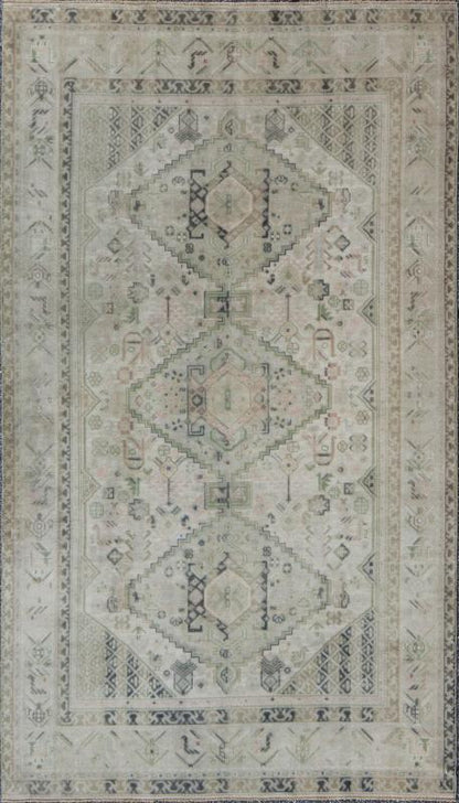 Vintage Turkish Tribal Medallion Oushak in Muted Green, Pink, and Off White Measures: 5'10 x 9'11. This vintage Turkish Oushak rug features a unique blend of colors and an intricately beautiful design. The medallions, arranged in a v... - Keivan Woven ArtsTU - VEY - 4602 - 7911Rug