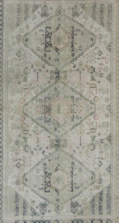 Vintage Turkish Tribal Medallion Oushak in Muted Green, Pink, and Off White Measures: 5'10 x 9'11. This vintage Turkish Oushak rug features a unique blend of colors and an intricately beautiful design. The medallions, arranged in a v... - Keivan Woven ArtsTU - VEY - 4602 - 7911Rug