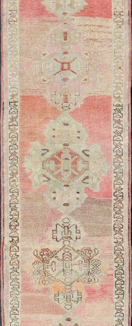 Vintage Turkish Oushak Runner with Medallion Design in Pink, Light Green & Taupe. Multi - Toned Medallion Oushak Carpet, rug tu - vey - 4811, country of origin / type: Turkey / Oushak, circa 1940. This Oushak Narrow runner from mid - 20th century Turkey ... - Keivan Woven ArtsTU - VEY - 4811 - 10812Rug