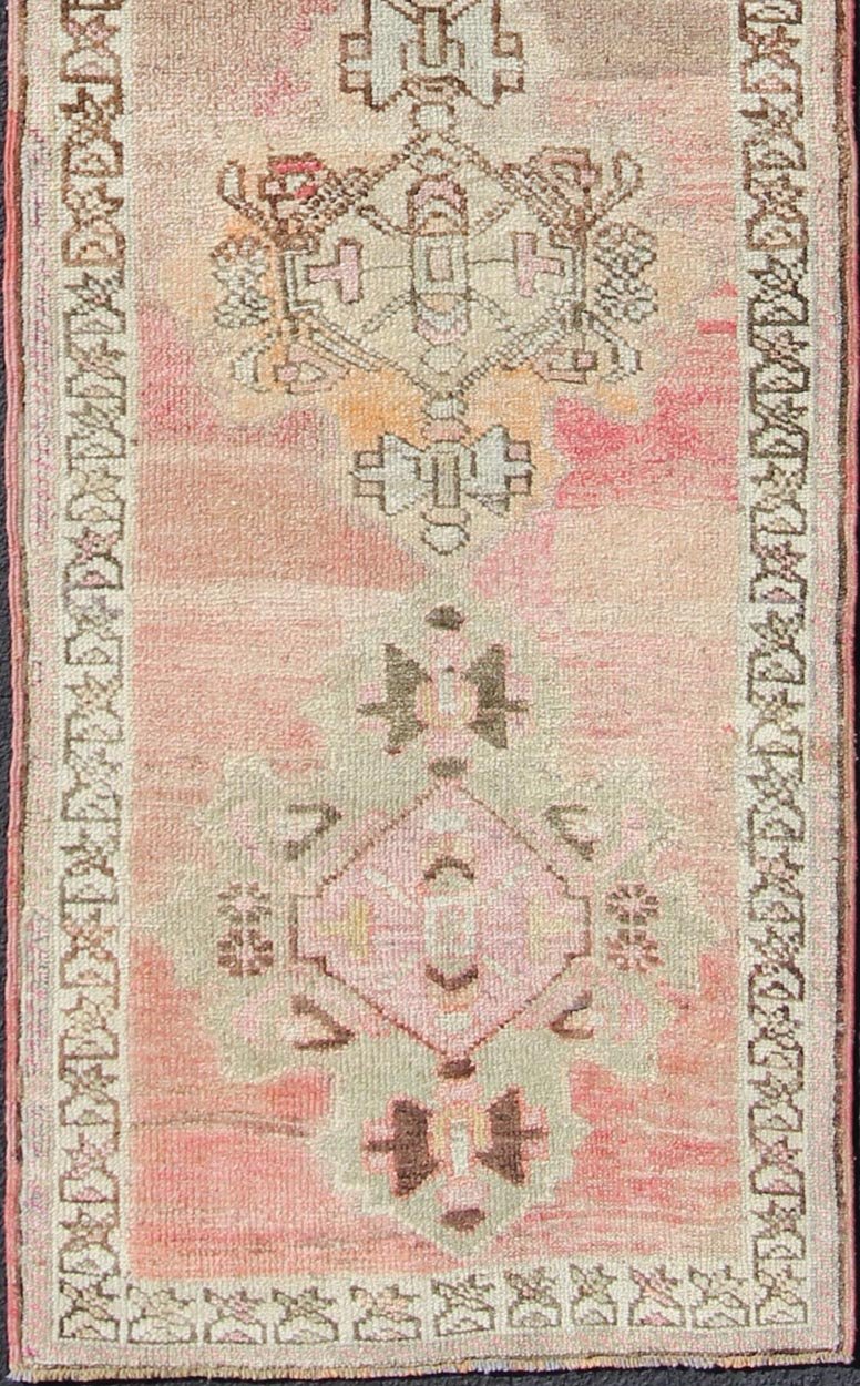 Vintage Turkish Oushak Runner with Medallion Design in Pink, Light Green & Taupe. Multi - Toned Medallion Oushak Carpet, rug tu - vey - 4811, country of origin / type: Turkey / Oushak, circa 1940. This Oushak Narrow runner from mid - 20th century Turkey ... - Keivan Woven ArtsTU - VEY - 4811 - 10812Rug
