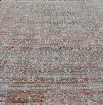 Antique Persian Distressed Sultanabad with All - Over Herati Design in Earthy Tones. rug V21 - 0105; country of origin / type: Persian / Sultanabad, circa 1920. Antique distressed Sultanabad. Measures: 11'10 x 16'6 This impressive antique distr... - Keivan Woven ArtsV21 - 0105 - 14530Rug