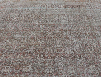 Antique Persian Distressed Sultanabad with All - Over Herati Design in Earthy Tones. rug V21 - 0105; country of origin / type: Persian / Sultanabad, circa 1920. Antique distressed Sultanabad. Measures: 11'10 x 16'6 This impressive antique distr... - Keivan Woven ArtsV21 - 0105 - 14530Rug