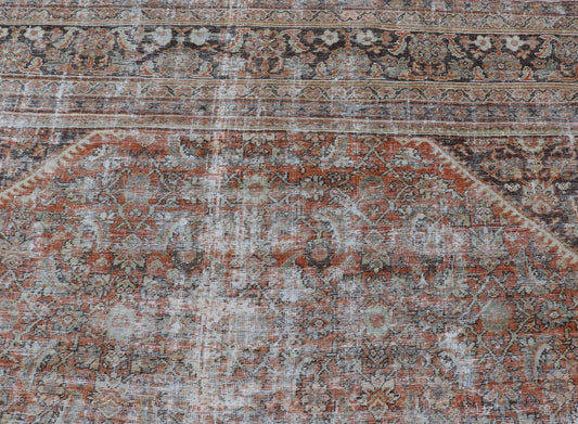 Distressed Antique Persian Mahal Rug in Wool with Floral Design On A Red Field. Keivan Woven Arts; rug V21 - 0107, country of origin / type: Iran / Mahal, circa 1920. Measures: 10'5 x 16'10 This antique Persian Mahal rug an all - over sub - geometric ... - Keivan Woven ArtsV21 - 0107 - 14886