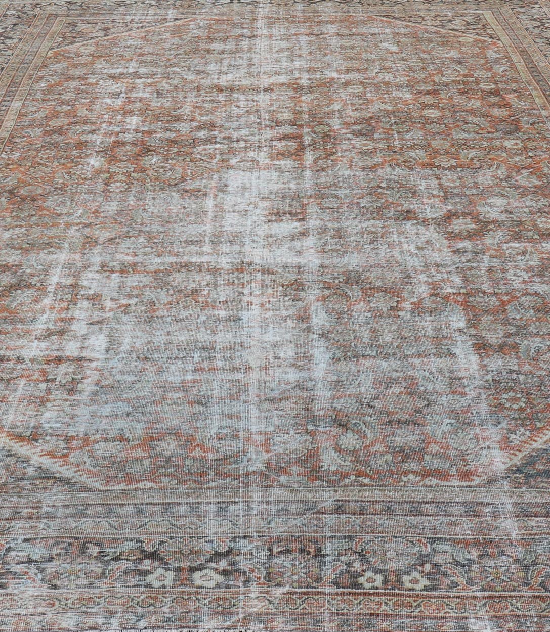 Distressed Antique Persian Mahal Rug in Wool with Floral Design On A Red Field. Keivan Woven Arts; rug V21 - 0107, country of origin / type: Iran / Mahal, circa 1920. Measures: 10'5 x 16'10 This antique Persian Mahal rug an all - over sub - geometric ... - Keivan Woven ArtsV21 - 0107 - 14886