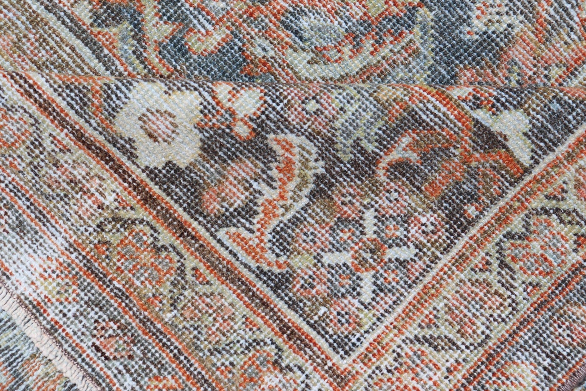 Distressed Antique Persian Mahal Rug in Wool with Floral Design On A Red Field. Keivan Woven Arts; rug V21 - 0107, country of origin / type: Iran / Mahal, circa 1920. Measures: 10'5 x 16'10 This antique Persian Mahal rug an all - over sub - geometric ... - Keivan Woven ArtsV21 - 0107 - 14886