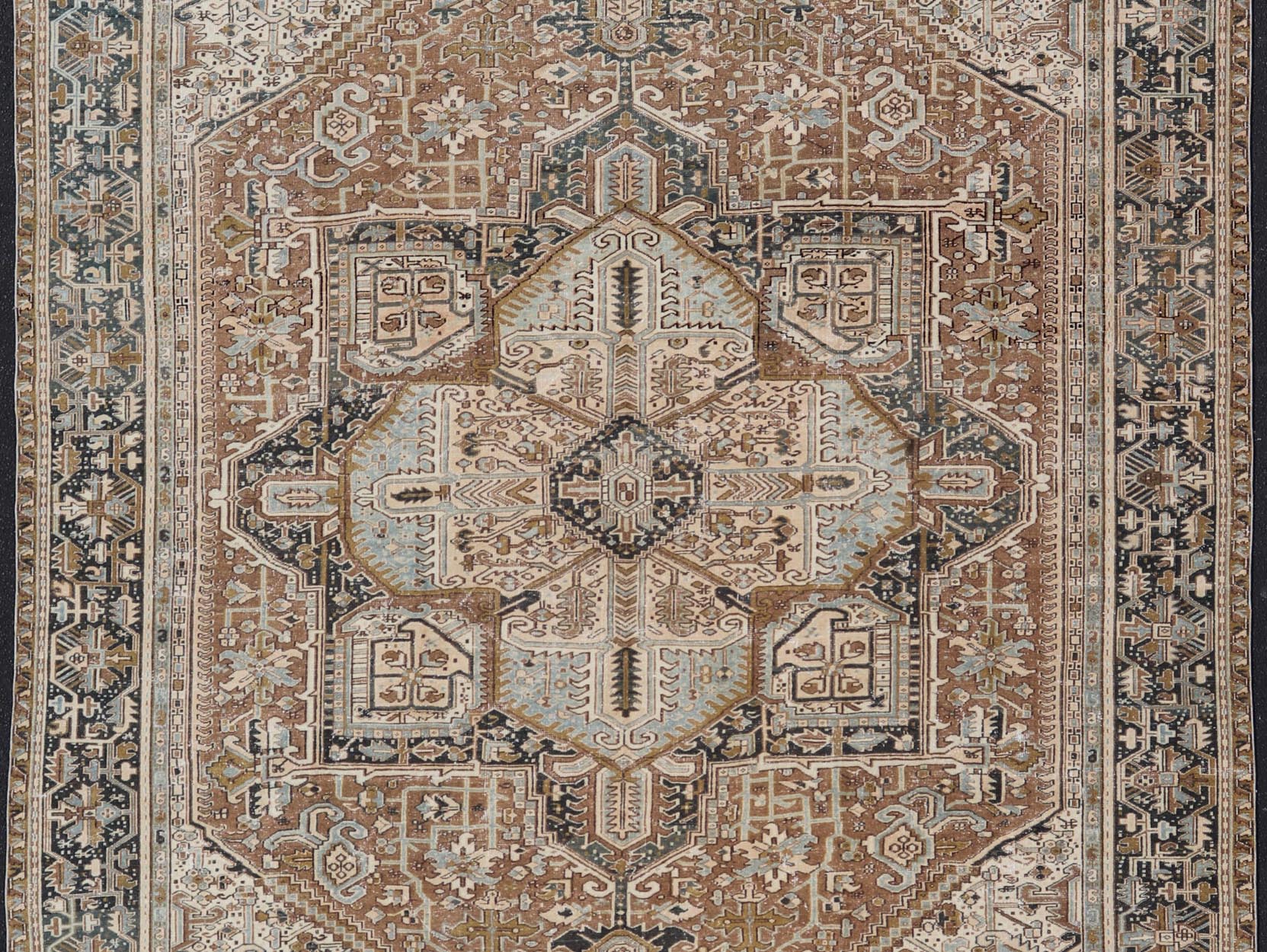 Persian Antique Heriz Rug with Geometric Design in Blue's, Tan, Cream, and Brown. Keivan Woven Arts / rug V21 - 0120, country of origin / type: Iran / Heriz, circa 1930 Measures: 11'5 x 14'7 This magnificent Persian Heriz carpet bears an ex... - Keivan Woven ArtsV21 - 0120 - 14844Rug