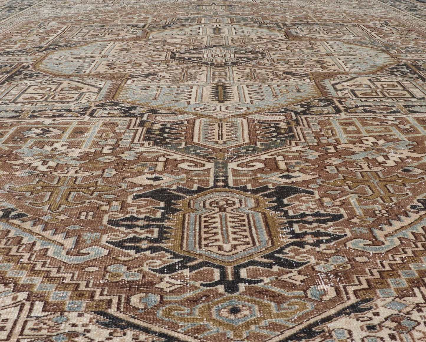 Persian Antique Heriz Rug with Geometric Design in Blue's, Tan, Cream, and Brown. Keivan Woven Arts / rug V21 - 0120, country of origin / type: Iran / Heriz, circa 1930 Measures: 11'5 x 14'7 This magnificent Persian Heriz carpet bears an ex... - Keivan Woven ArtsV21 - 0120 - 14844Rug