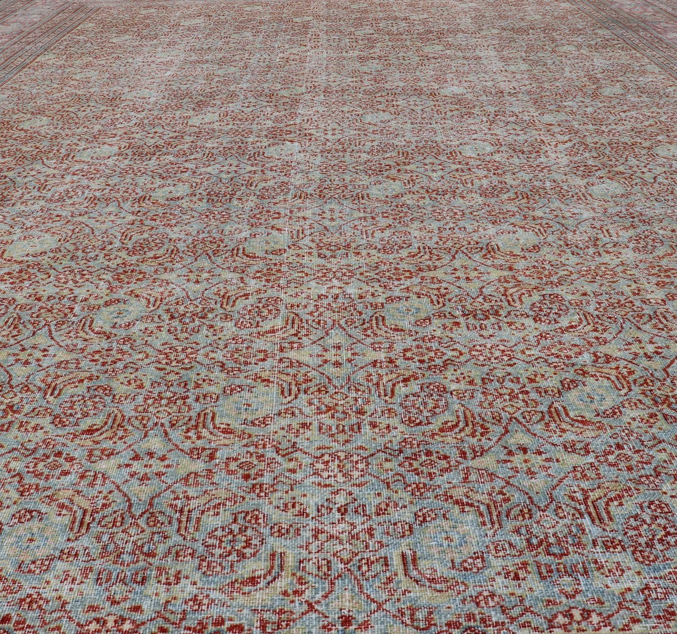 Antique Persian Khorassan Rug with All - Over Floral Design in Red and Blue. Country of Origin: Iran Type: Khorasan Design: All - Over, Floral, Motif Keivan Woven Arts; rug V21 - 0201 Measures: 8'4 x 11'5 This spectacular antique Persian Khoras... - Keivan Woven ArtsV21 - 0201 - 15086Rug