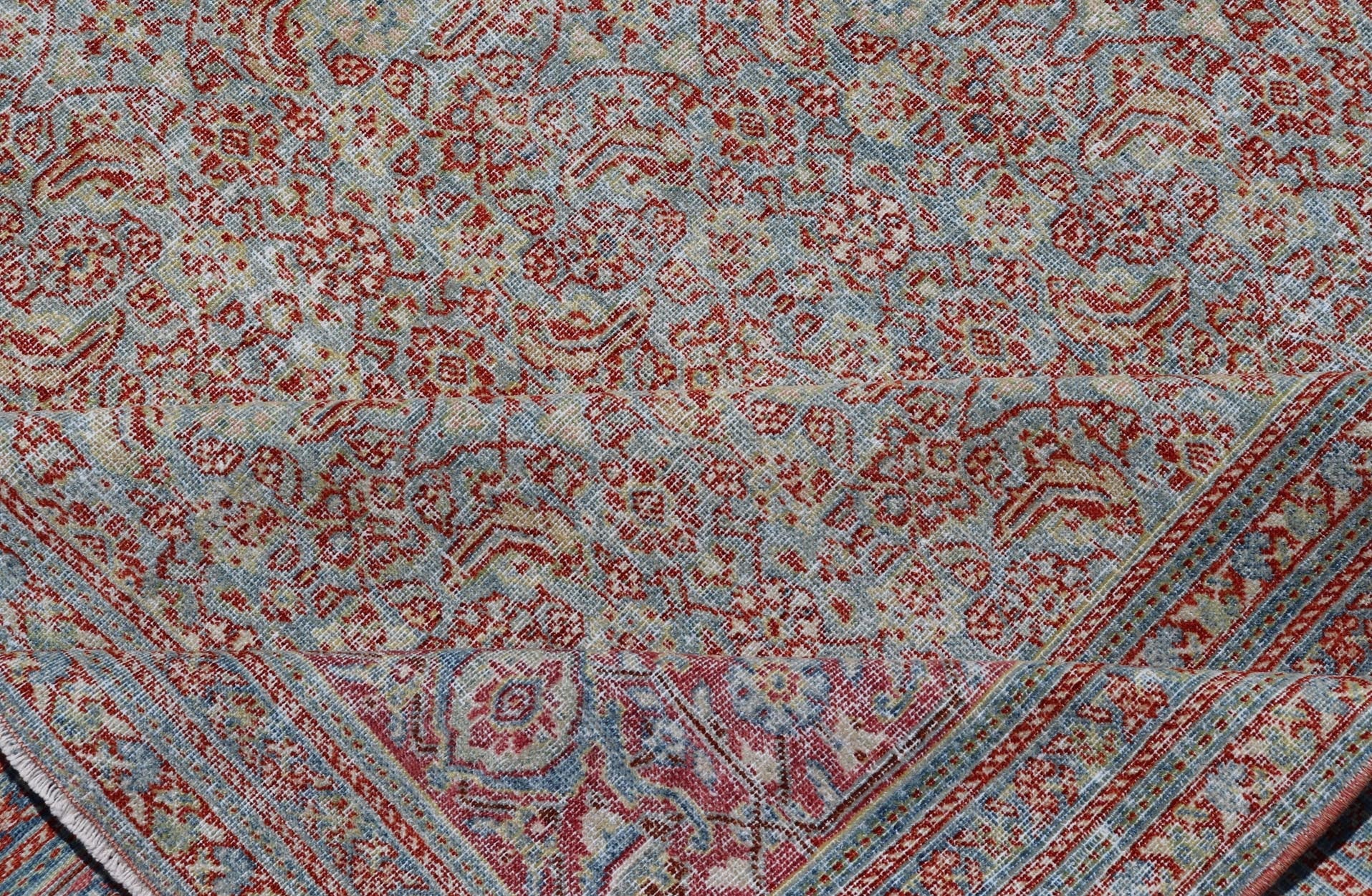 Antique Persian Khorassan Rug with All - Over Floral Design in Red and Blue. Country of Origin: Iran Type: Khorasan Design: All - Over, Floral, Motif Keivan Woven Arts; rug V21 - 0201 Measures: 8'4 x 11'5 This spectacular antique Persian Khoras... - Keivan Woven ArtsV21 - 0201 - 15086Rug