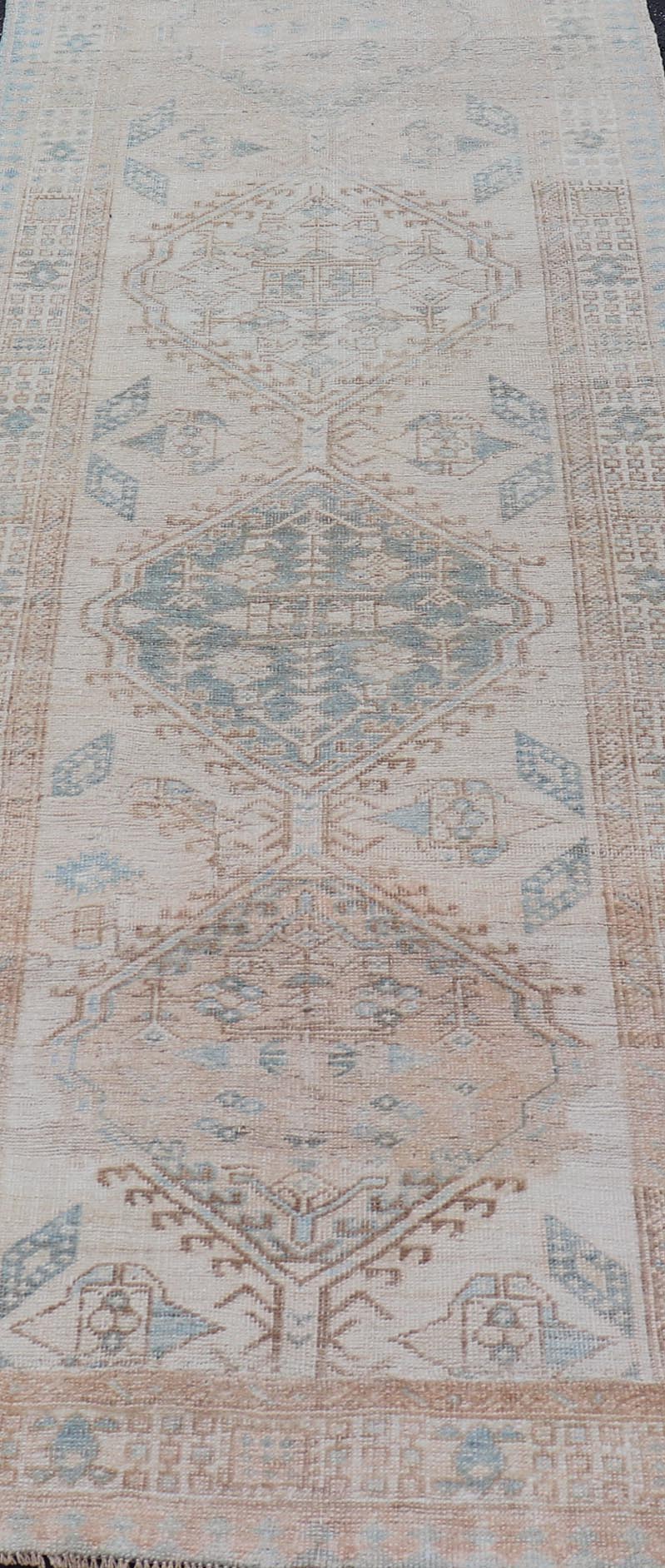 Antique Persian Sarab Runner with Sub - Geometric Medallion Design in Muted Tones. rug V21 - 0203, Keivan Woven Arts, country of origin / type: Persian / Sarab, circa 1920. Measures: 2'11 x 8'10 This antique Sarab runner features a sub - geometric med... - Keivan Woven ArtsV21 - 0203 - 15530Rug