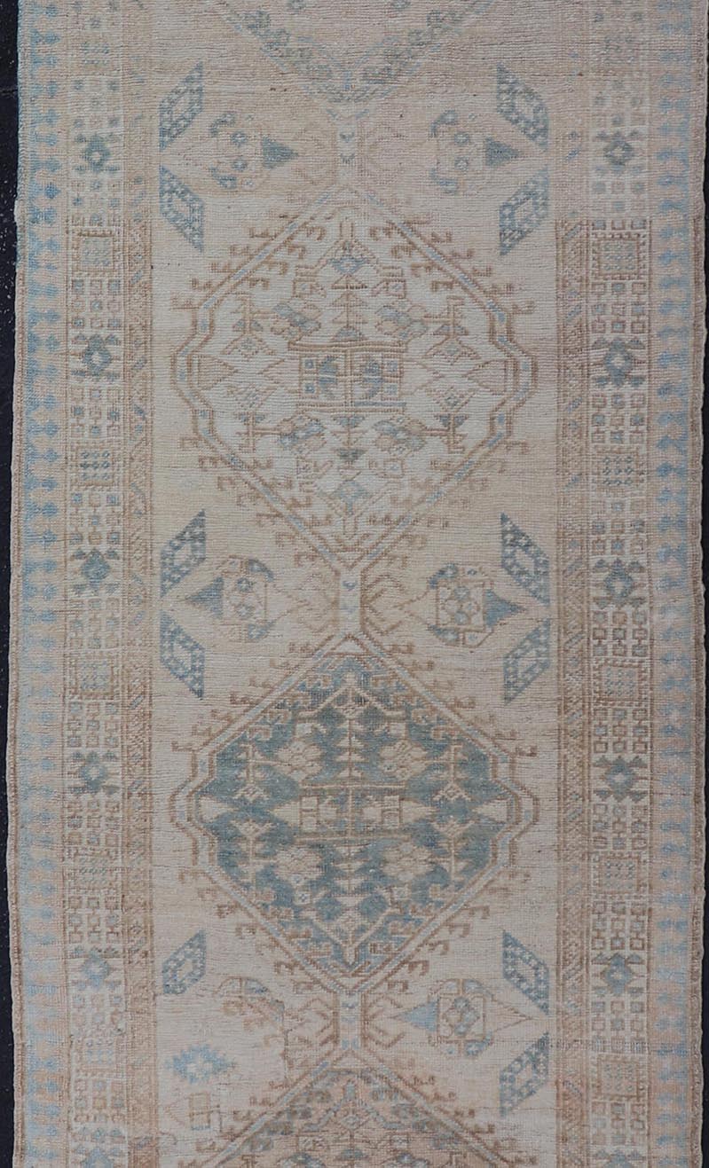 Antique Persian Sarab Runner with Sub - Geometric Medallion Design in Muted Tones. rug V21 - 0203, Keivan Woven Arts, country of origin / type: Persian / Sarab, circa 1920. Measures: 2'11 x 8'10 This antique Sarab runner features a sub - geometric med... - Keivan Woven ArtsV21 - 0203 - 15530Rug