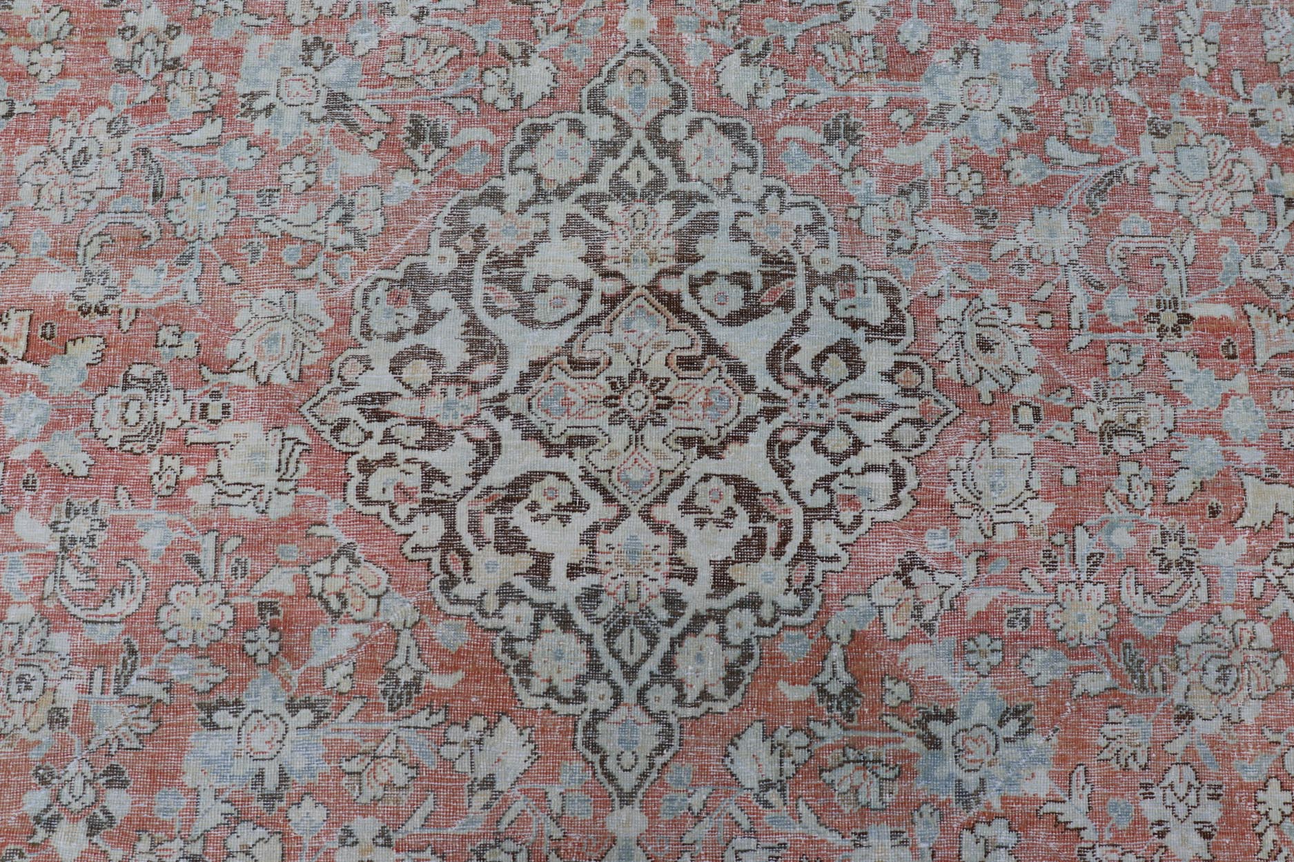 Distressed Antique Medallion Persian Mahal Rug In Faded Orange, Cream, And Brown. Keivan Woven Arts / rug V21 - 0301, country of origin / type: Iran / Mahal, circa 1920s Measures: 10'9 x 13'10 This beautiful antique Persian Mahal rug features an c... - Keivan Woven ArtsV21 - 0301 - 15224