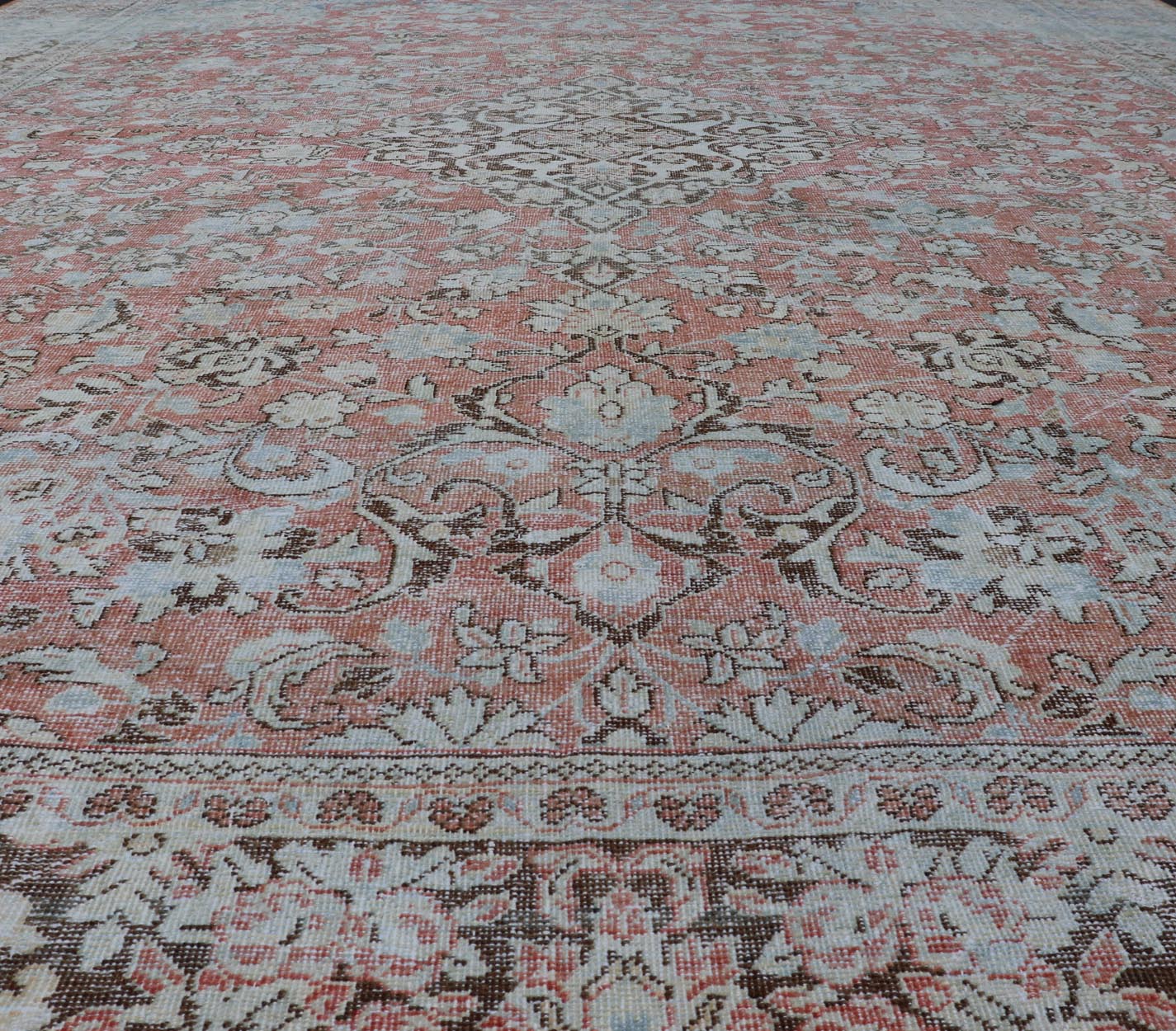 Distressed Antique Medallion Persian Mahal Rug In Faded Orange, Cream, And Brown. Keivan Woven Arts / rug V21 - 0301, country of origin / type: Iran / Mahal, circa 1920s Measures: 10'9 x 13'10 This beautiful antique Persian Mahal rug features an c... - Keivan Woven ArtsV21 - 0301 - 15224