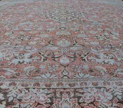 Distressed Antique Medallion Persian Mahal Rug In Faded Orange, Cream, And Brown. Keivan Woven Arts / rug V21 - 0301, country of origin / type: Iran / Mahal, circa 1920s Measures: 10'9 x 13'10 This beautiful antique Persian Mahal rug features an c... - Keivan Woven ArtsV21 - 0301 - 15224