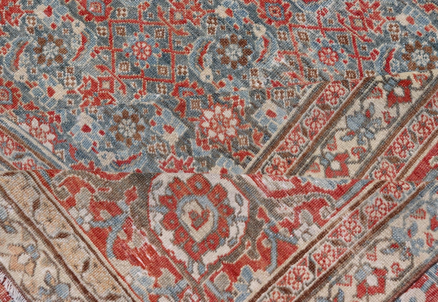 Antique Persian Fine Weave Senneh Rug with All - Over Herati Design on Blue Field. Keivan Woven Arts / rug V21 - 0305, country of origin / type: Iran / Senneh, circa 1920. Measures: 8'3 x 10'5 This incredible antique distressed Persian Senn... - Keivan Woven ArtsV21 - 0305 - 51 - 15248