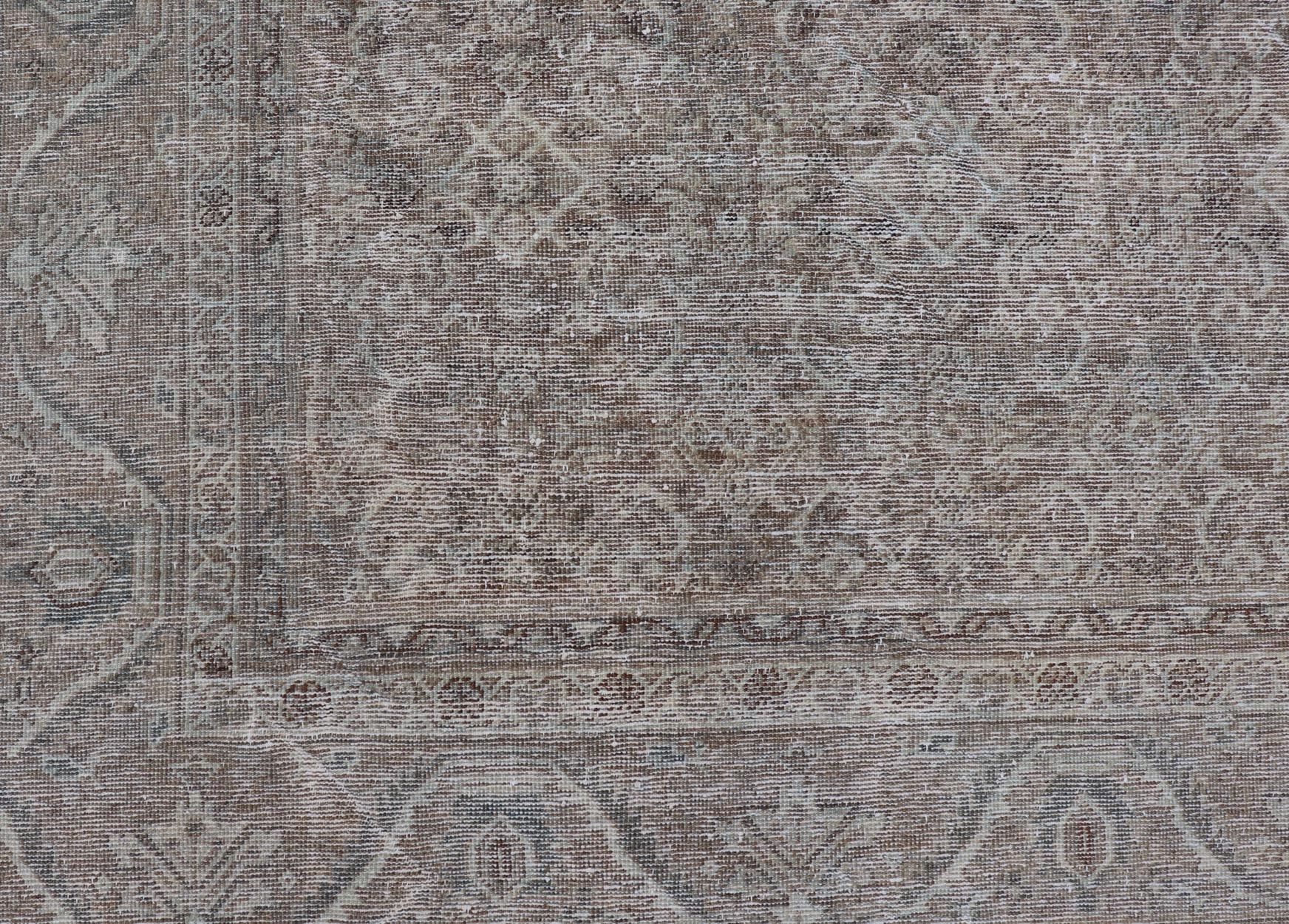Antique Persian Distressed Mahal Rug in Warm Earthy Tones with All - Over Design. Keivan Woven Arts / rug V21 - 0402, country of origin / type: Iran / Mahal, circa 1920 Measures: 10'4 x 13'3 This beautiful distressed antique Persian Mahal ru... - Keivan Woven ArtsV21 - 0402 - 15548Rug