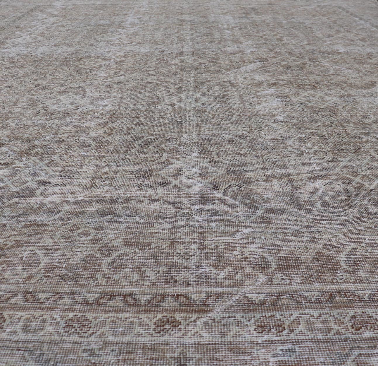 Antique Persian Distressed Mahal Rug in Warm Earthy Tones with All - Over Design. Keivan Woven Arts / rug V21 - 0402, country of origin / type: Iran / Mahal, circa 1920 Measures: 10'4 x 13'3 This beautiful distressed antique Persian Mahal ru... - Keivan Woven ArtsV21 - 0402 - 15548