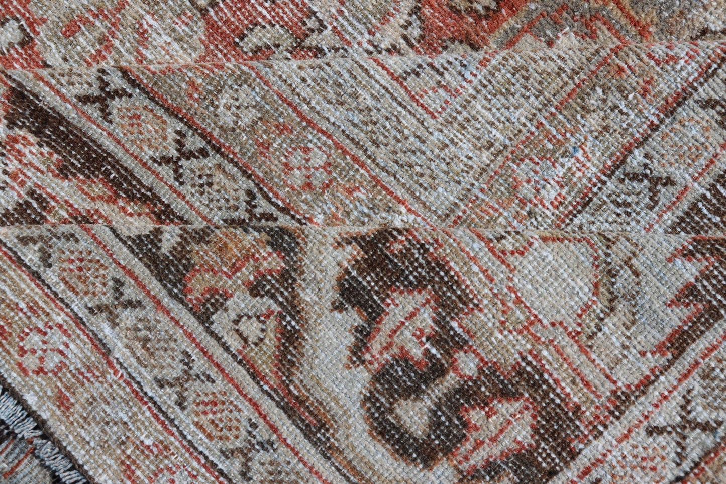 Distressed Antique Hand - Knotted Sultanabad Rug in Wool with Floral Design This antique Persian Sultanabad rug an all - over sub - geometric floral design rendered in orange and earthy tones, set upon an orange background. A complementary, multi - tie... - Keivan Woven ArtsV21 - 0501 - 15719