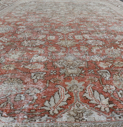 Distressed Antique Hand - Knotted Sultanabad Rug in Wool with Floral Design This antique Persian Sultanabad rug an all - over sub - geometric floral design rendered in orange and earthy tones, set upon an orange background. A complementary, multi - tie... - Keivan Woven ArtsV21 - 0501 - 15719
