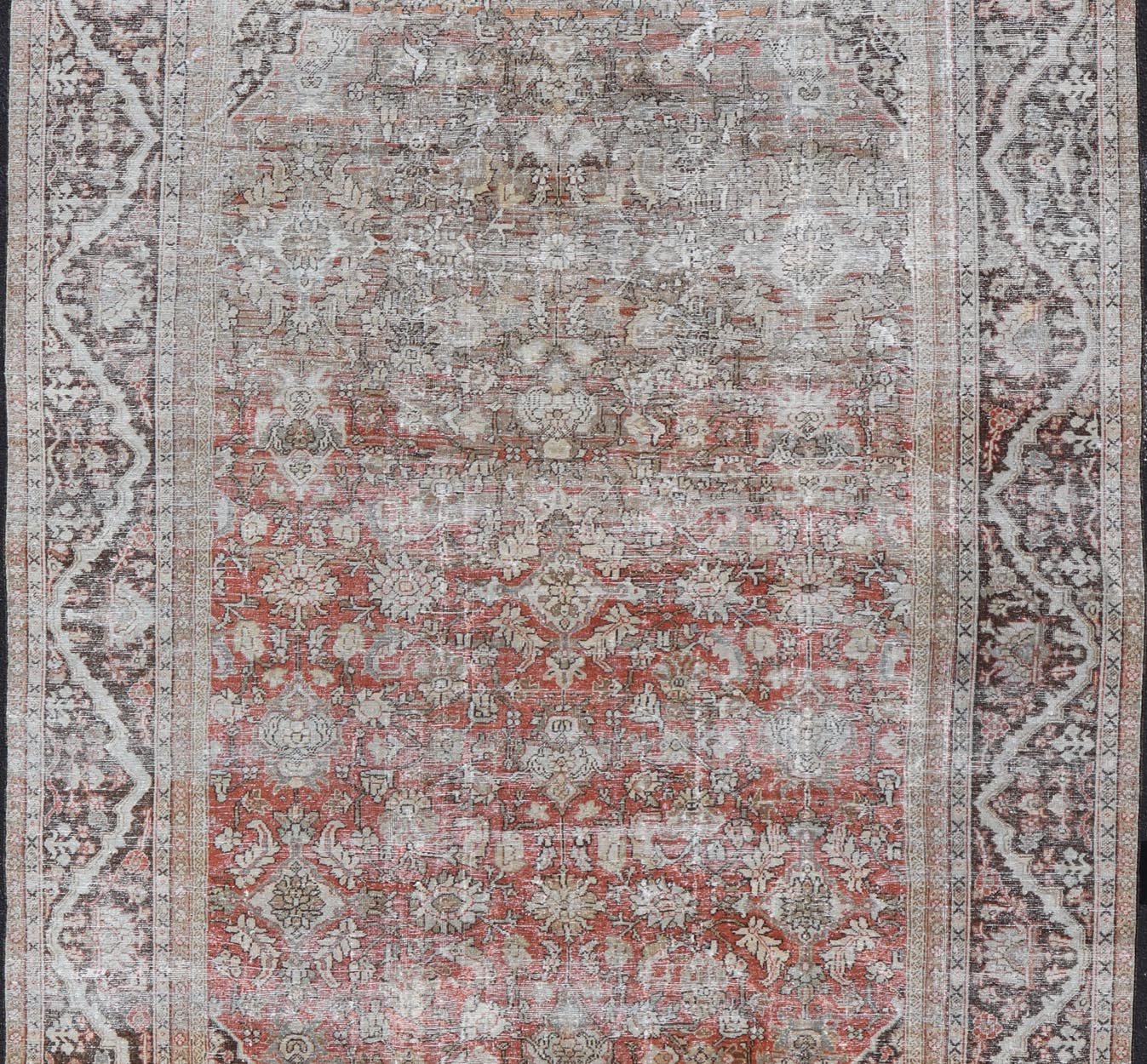 Distressed Antique Hand - Knotted Sultanabad Rug in Wool with Floral Design This antique Persian Sultanabad rug an all - over sub - geometric floral design rendered in orange and earthy tones, set upon an orange background. A complementary, multi - tie... - Keivan Woven ArtsV21 - 0501 - 15719