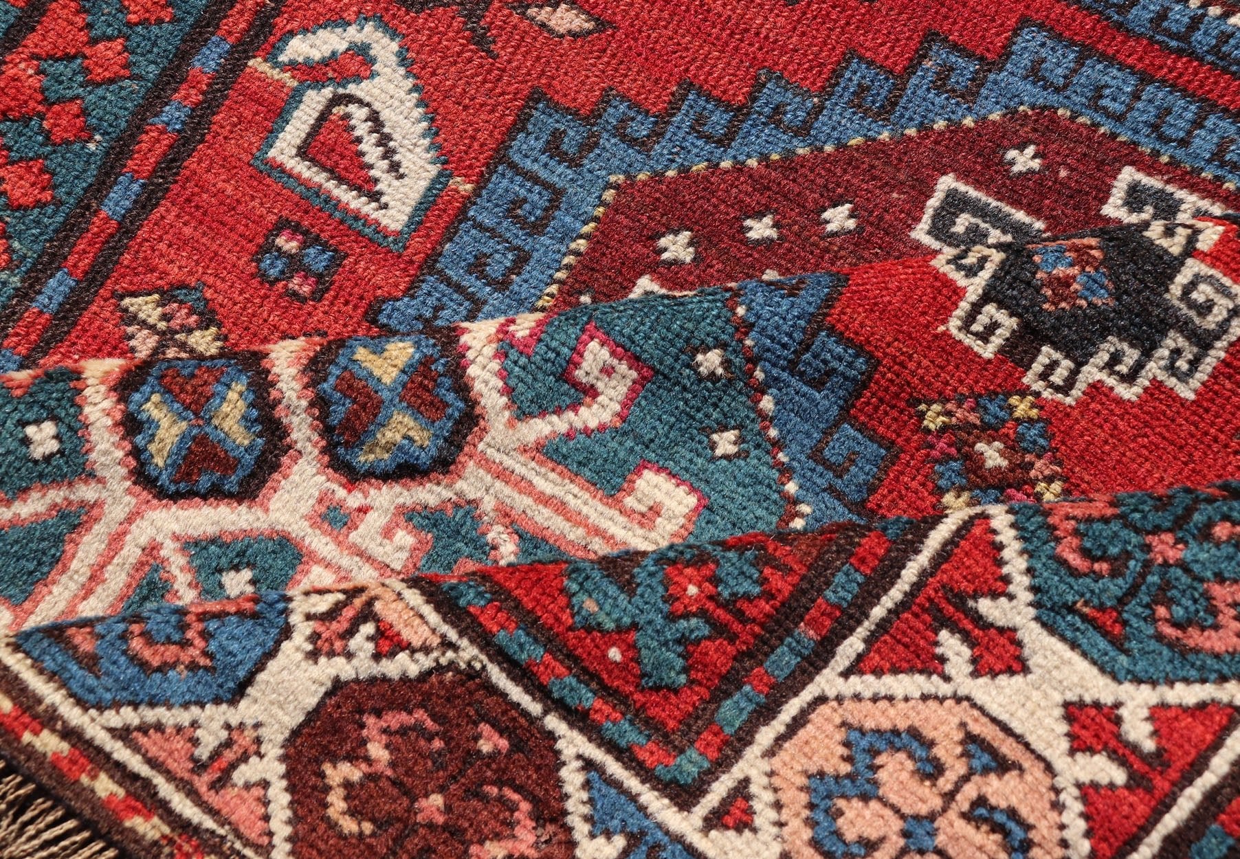 Antique Hand Knotted Caucasian Kazak Rug in Brilliant Red with Geometric Design Tribal geometric medallion design Kazak antique rug, antique Caucasian from Caucasus Region with a beautiful red background in multi - colors, Keivan Woven Arts rug V2... - Keivan Woven ArtsV21 - 0502 - 16394Rug