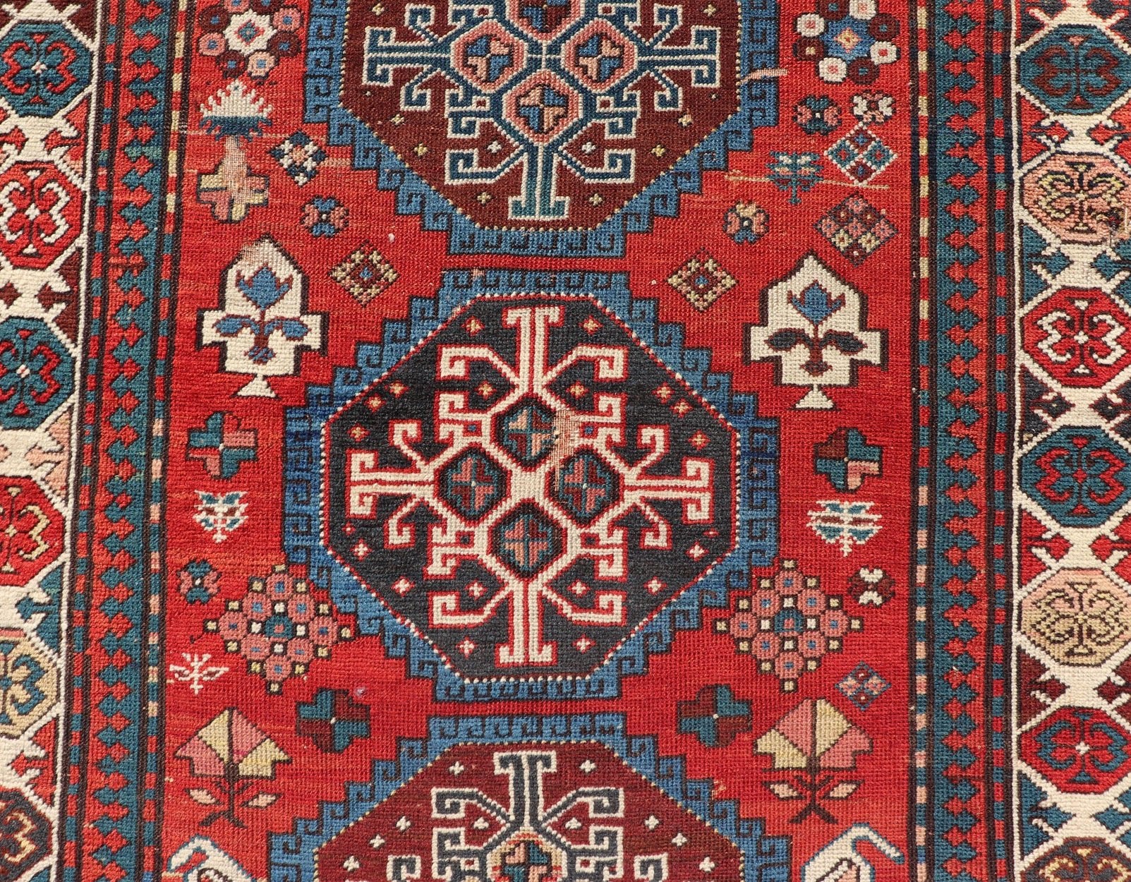 Antique Hand Knotted Caucasian Kazak Rug in Brilliant Red with Geometric Design Tribal geometric medallion design Kazak antique rug, antique Caucasian from Caucasus Region with a beautiful red background in multi - colors, Keivan Woven Arts rug V2... - Keivan Woven ArtsV21 - 0502 - 16394