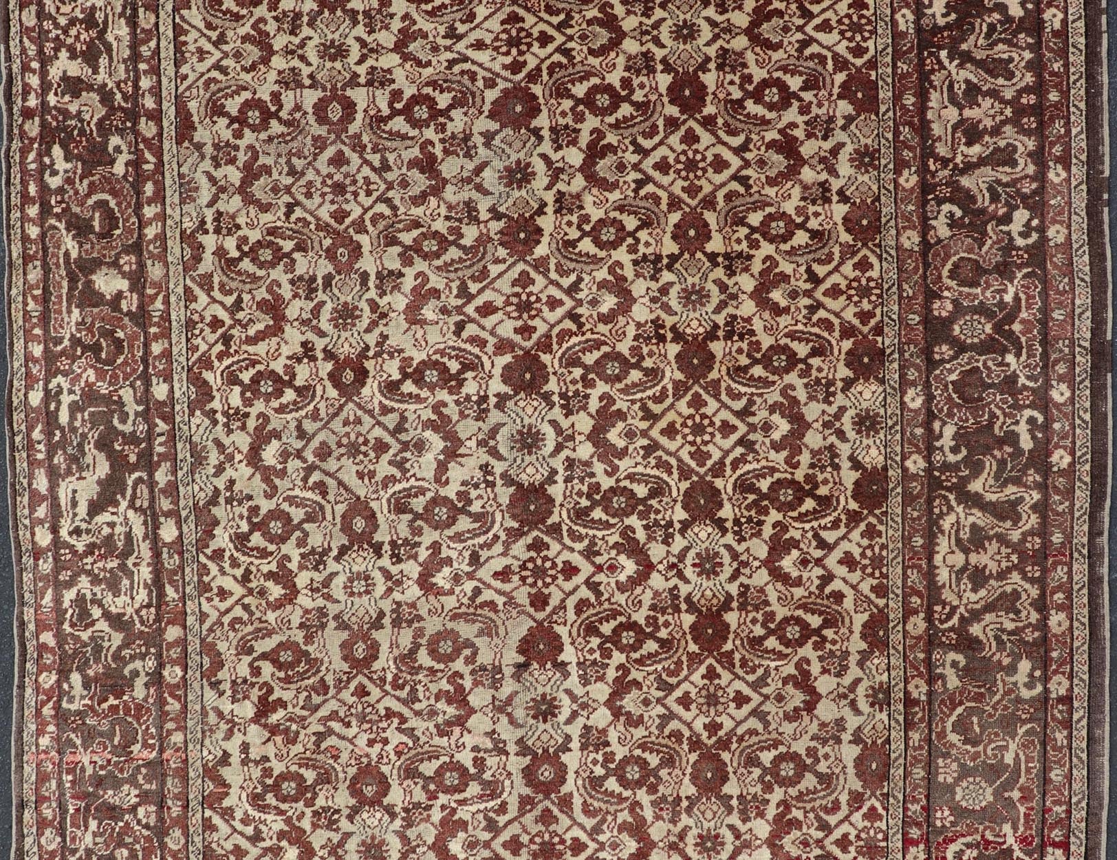 Antique Turkish Sivas Rug with Tan Background and Maroon, Eggplant, Brown Color. Stylized antique Turkish Sivas rug with Ivory background and maroon, Eggplant, Brown Colors rug V21 - 0601, country of origin / type: Turkey / Sivas, circa 1920 S... - Keivan Woven ArtsV21 - 0601 - 16498Rug