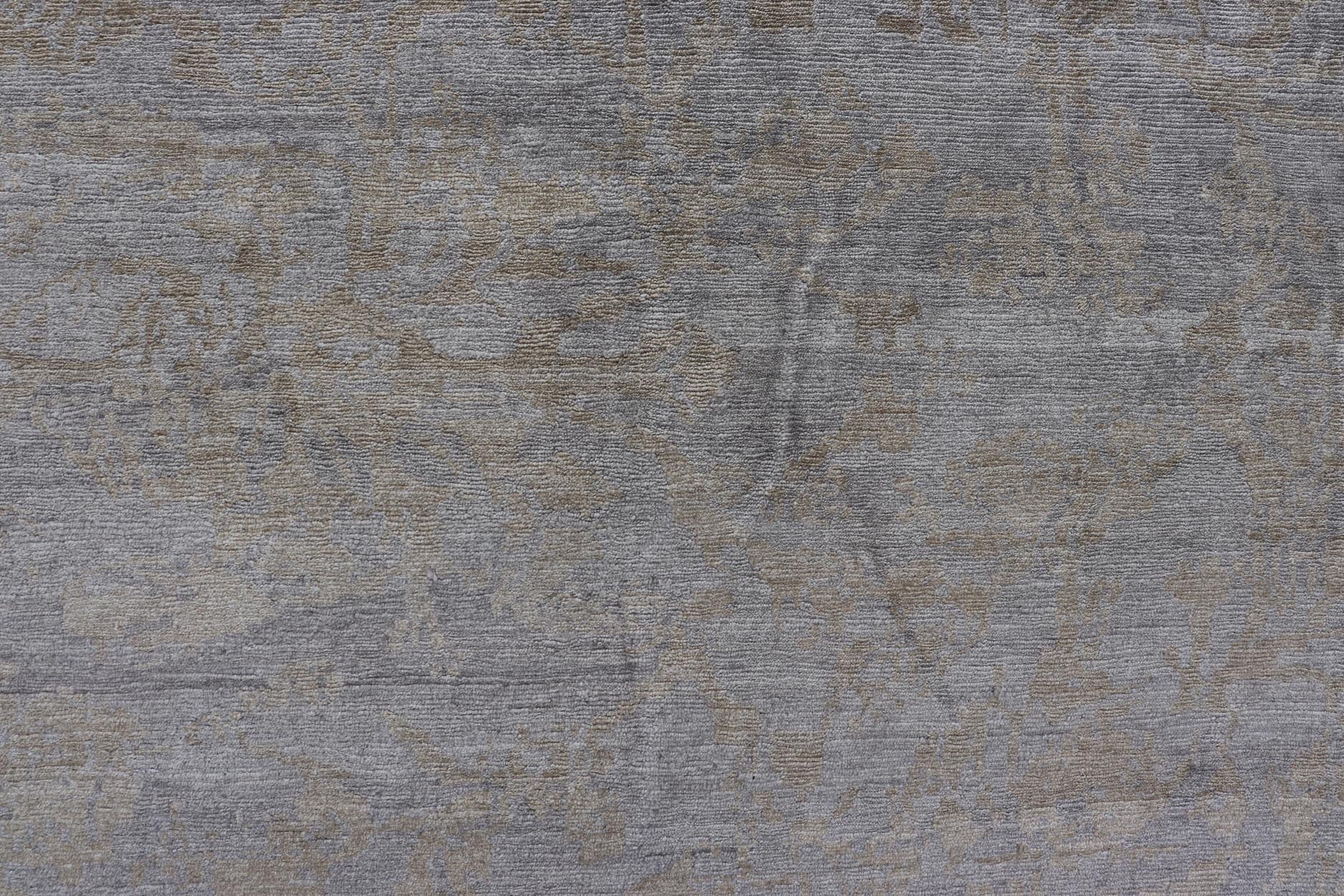 Modern Hand - Knotted silk Tibetan Rug by Keivan Woven Arts Modern Hand - Knotted Silk Tibetan Rug by Keivan Woven Arts. This modern hand - knotted Tibetan rug features an all - over floral design set upon grey background with details in taupe. The ent... - Keivan Woven ArtsV21 - 0803 - 16973