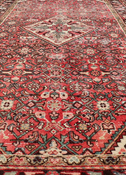 Semi Antique Persian Distressed Hamadan Gallery Rug with Medallion Design Persian Gallery semi antique Hamadan rug with medallion design in Soft red, brown, green and ivory. Rug V21 - 0805, country of origin / type: Iran / Hamadan , circa mi... - Keivan Woven ArtsV21 - 0805 - 16979