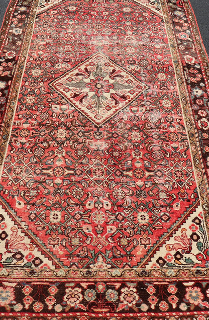 Semi Antique Persian Distressed Hamadan Gallery Rug with Medallion Design Persian Gallery semi antique Hamadan rug with medallion design in Soft red, brown, green and ivory. Rug V21 - 0805, country of origin / type: Iran / Hamadan , circa mi... - Keivan Woven ArtsV21 - 0805 - 16979