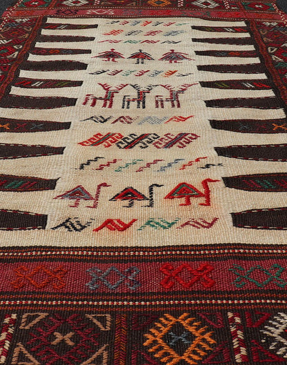 Vintage Tribal Baluch Rug With Pile and Kilim in Ivory Background Vintage Baluch Tribal rug in Shades of brown, tan, cream and red, This rug has a pair which is also listed on this website,V21 - 0810 Rug V21 - 0809, country of origin / type: Ir... - Keivan Woven ArtsV21 - 0809 - 16997Rug