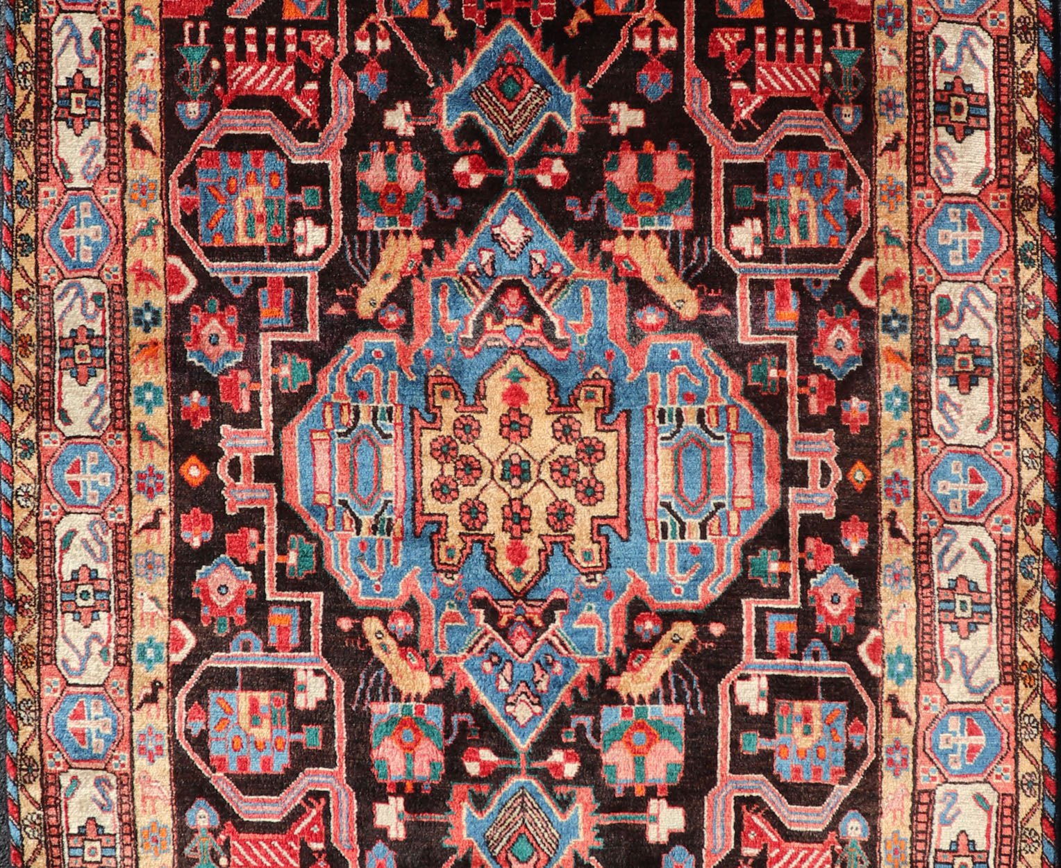 Antique Persian Nahavand Rug with All - Over Sub - Geometric Tribal Design Measures: 4'3 x 9'4. This absolutely stunning Antique Nahavand (circa 1920s) features a symmetrical sub - geometric design rendered in shades of reds, blues, greens, cre... - Keivan Woven ArtsV21 - 1103 - 18341