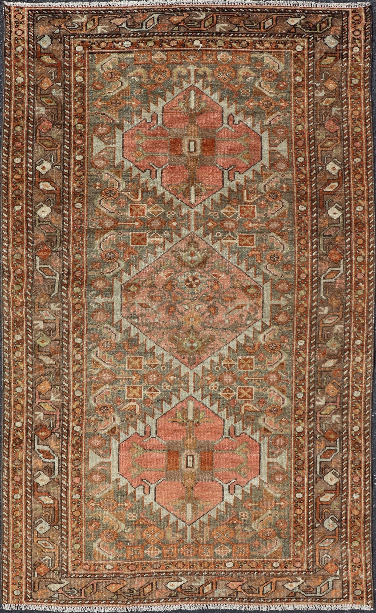 Antique Persian Hamedan in Rustic Earthy Tones With Tribal Medallions This antique hamadan features three medallions in the field, surrounded by sub - geometric tribal motifs. The complementary border displays a geometric tribal design, wrapp... - Keivan Woven ArtsV21 - 1201 - 18395