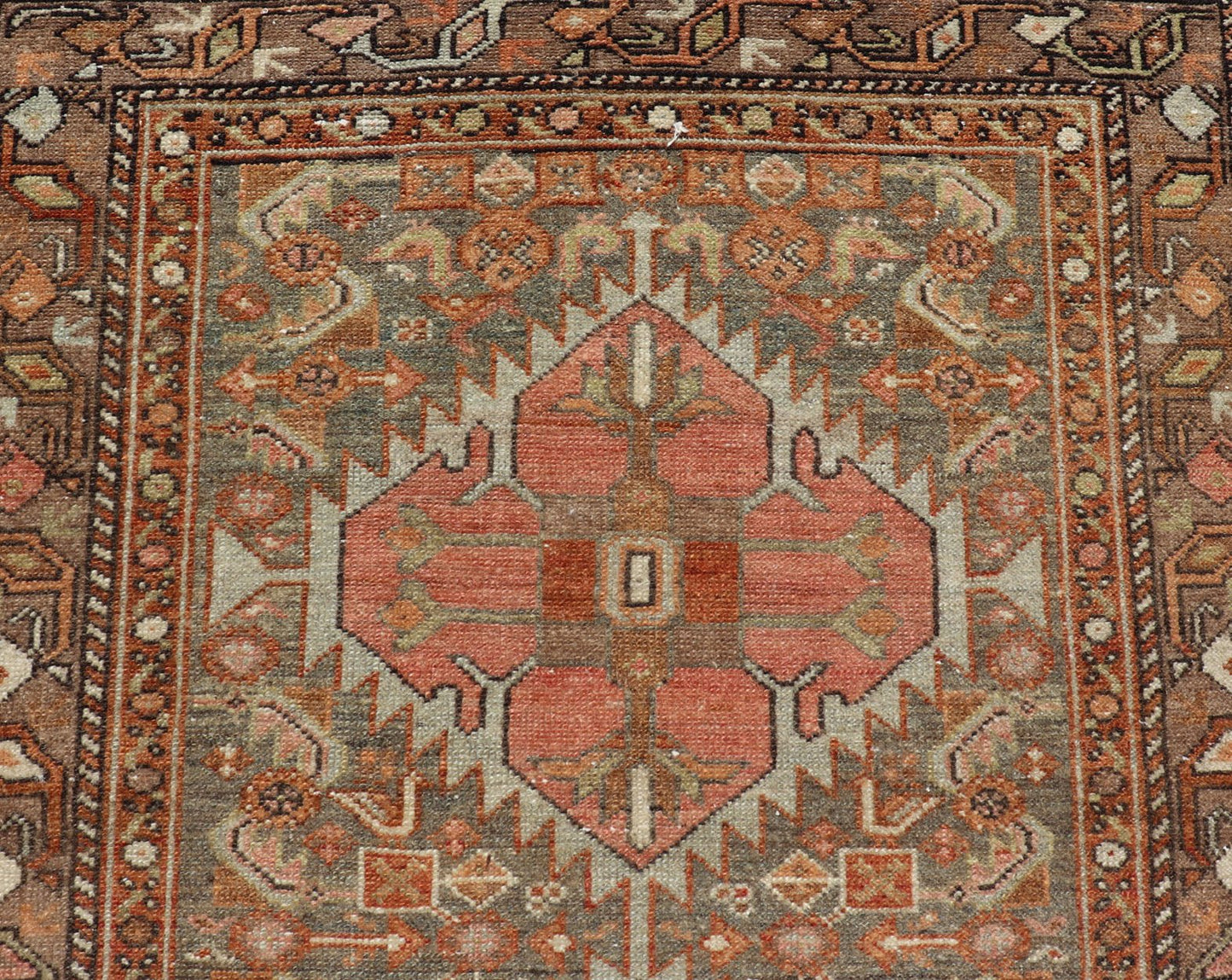 Antique Persian Hamedan in Rustic Earthy Tones With Tribal Medallions This antique hamadan features three medallions in the field, surrounded by sub - geometric tribal motifs. The complementary border displays a geometric tribal design, wrapp... - Keivan Woven ArtsV21 - 1201 - 18395
