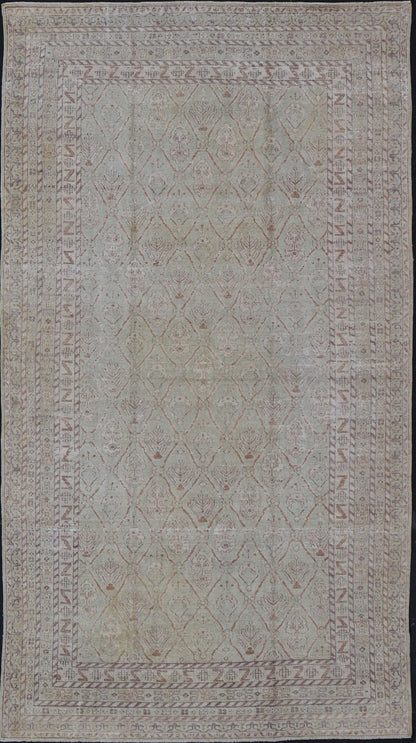 Large Indian Vintage Amritsar in Jade and Bronze This unique piece features many designs, starting from leaflet motifs, encased in the geometric diamonds, to the seemingly endless tiers of borders and bands, each displaying their o... - Keivan Woven ArtsV21 - 1204 - 18407Rug