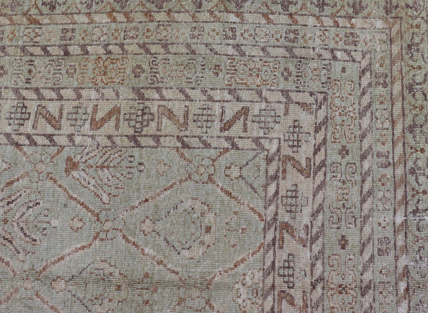 Large Indian Vintage Amritsar in Jade and Bronze This unique piece features many designs, starting from leaflet motifs, encased in the geometric diamonds, to the seemingly endless tiers of borders and bands, each displaying their o... - Keivan Woven ArtsV21 - 1204 - 18407Rug