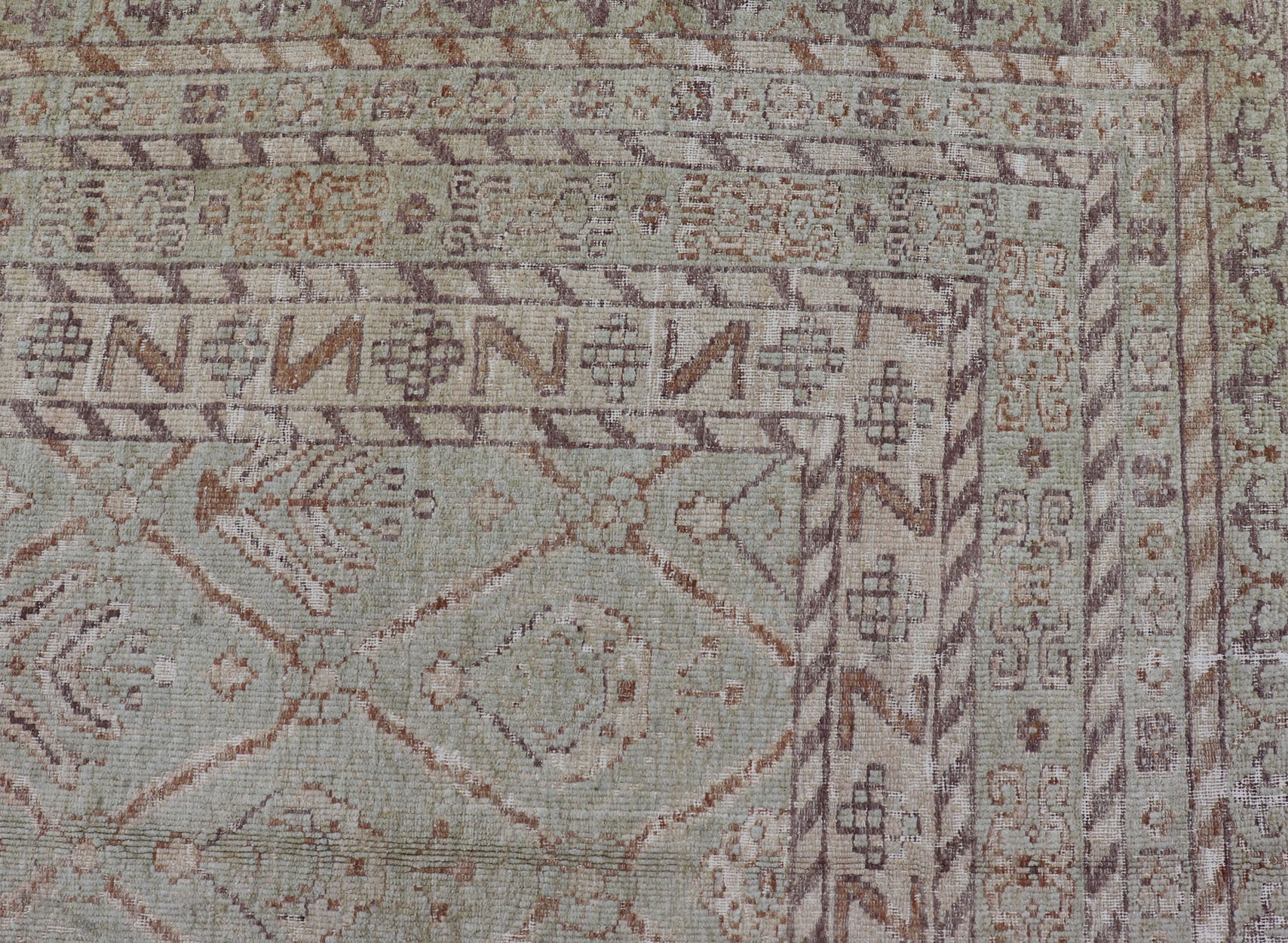 Large Indian Vintage Amritsar in Jade and Bronze This unique piece features many designs, starting from leaflet motifs, encased in the geometric diamonds, to the seemingly endless tiers of borders and bands, each displaying their o... - Keivan Woven ArtsV21 - 1204 - 18407Rug