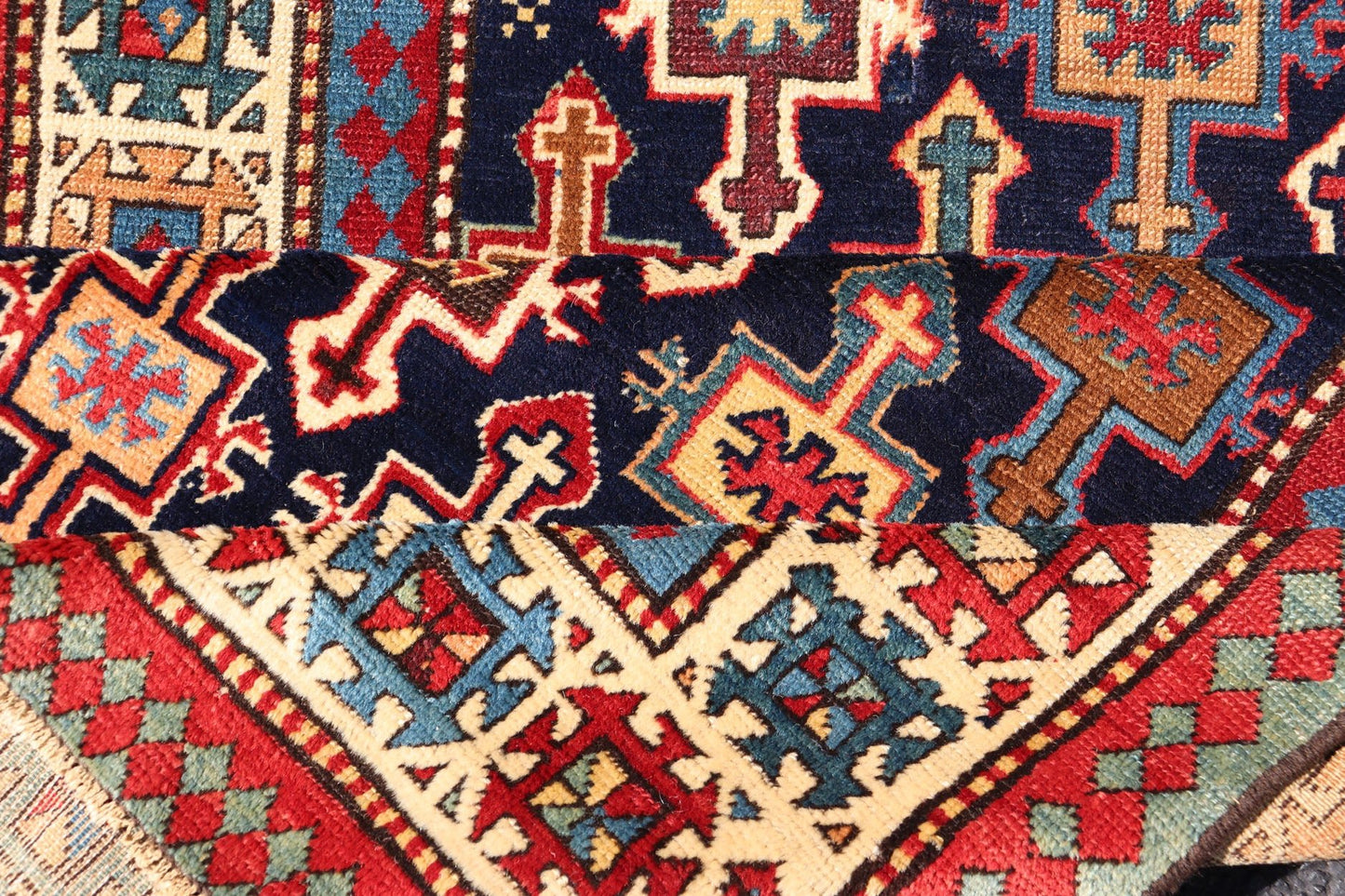 Late 19th Century Kazak Runner with Geometric Design in Tribal Crosses. Country of Origin: Caucasus Type: Kazak Design: All - Over, Sub - Geometric, Medallion Keivan Woven Arts; rug V21 - 1211 Measures; 3'3 x 9'1 This piece was hand - knotted in Caucasu... - Keivan Woven ArtsV21 - 1211 - 18485Rug