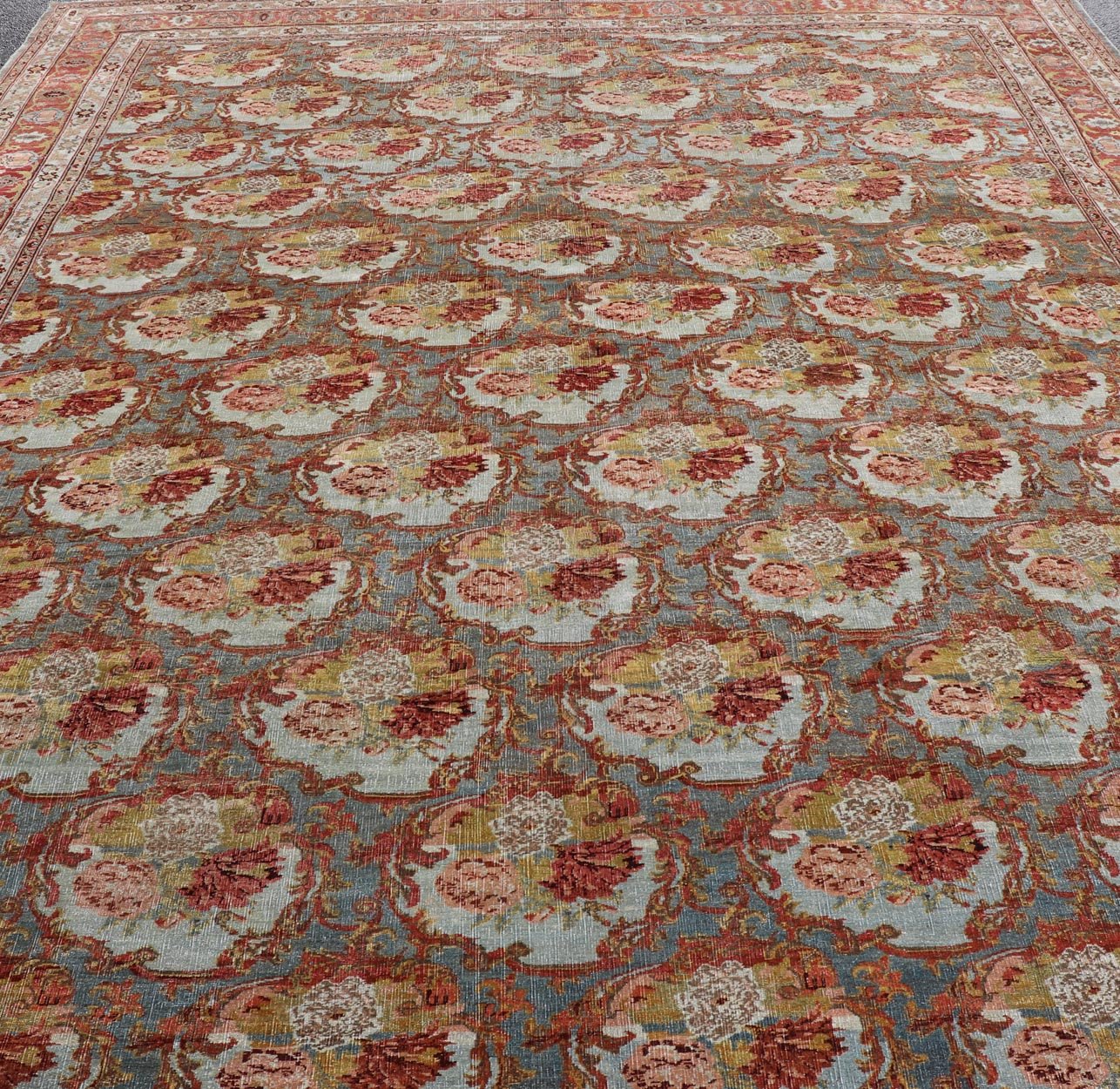 Large Antique Persian Bidjar Rug with Blossoming Floral Design in Blue and Red. Keivan Woven Arts / rug V21 - 1215 - 15483, country of origin / type: Iran / Bidjar, circa 1900. Measures: 11'10 x 15'5 This magnificent Bidjar with an exquisite, all - o... - Keivan Woven ArtsV21 - 1215 - 15483 - 18505Rug