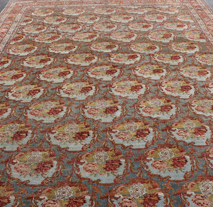 Large Antique Persian Bidjar Rug with Blossoming Floral Design in Blue and Red. Keivan Woven Arts / rug V21 - 1215 - 15483, country of origin / type: Iran / Bidjar, circa 1900. Measures: 11'10 x 15'5 This magnificent Bidjar with an exquisite, all - o... - Keivan Woven ArtsV21 - 1215 - 15483 - 18505Rug
